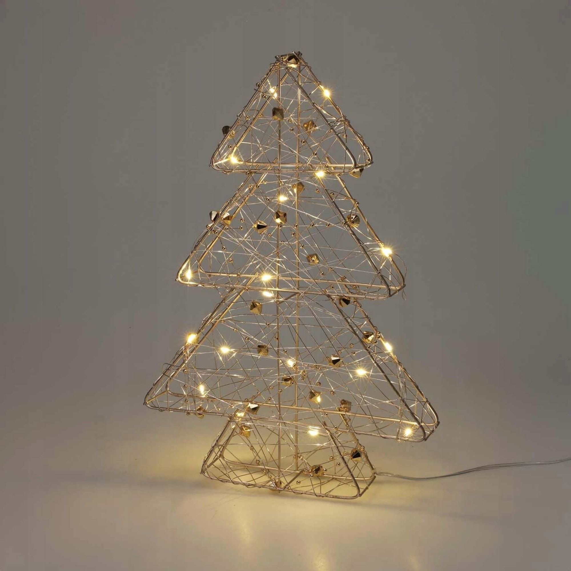 árbol navideño metálico dorado con 20 luces led blancas cálidad 21x4x30cm