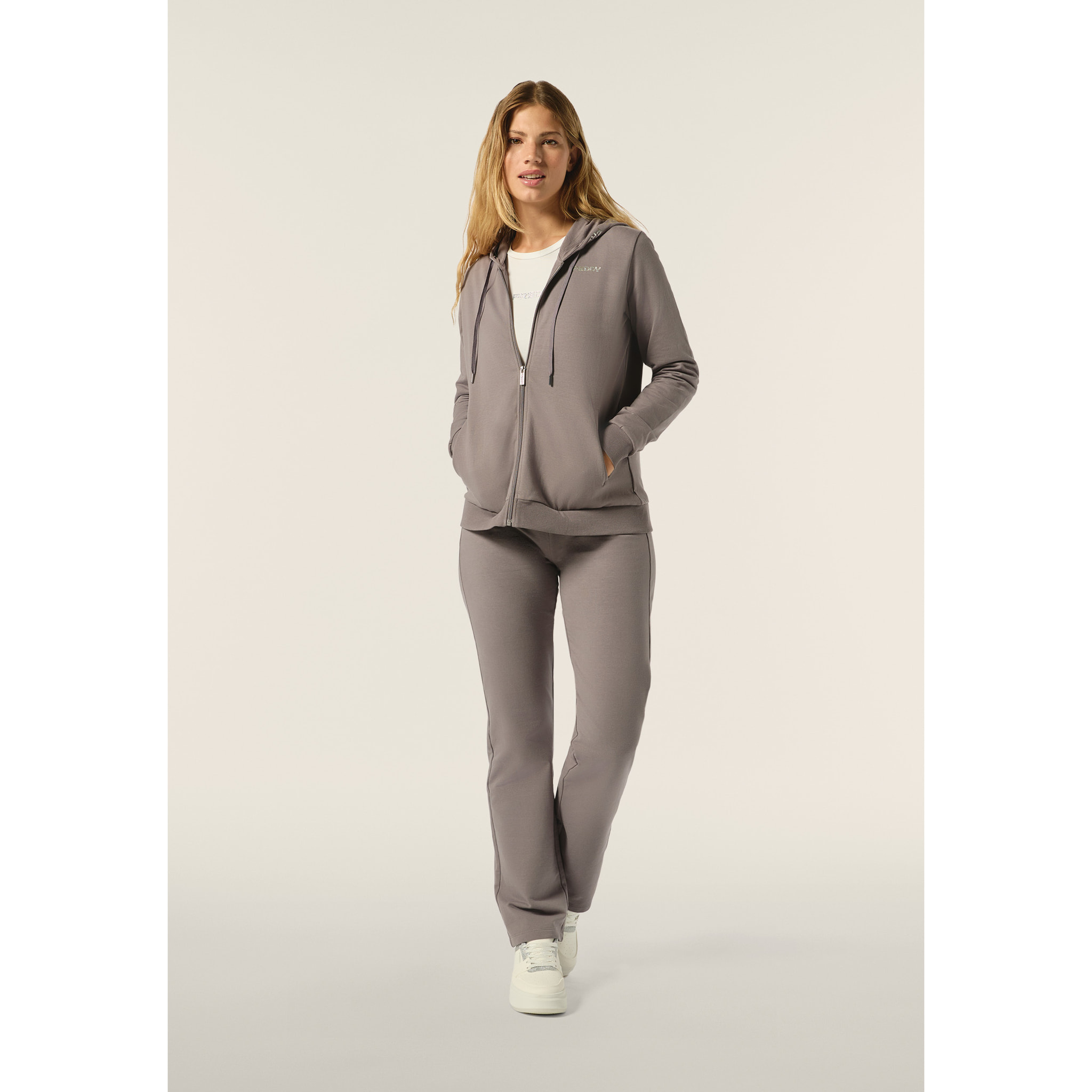 Tuta donna comfort fit in felpa con cappuccio stampe argento