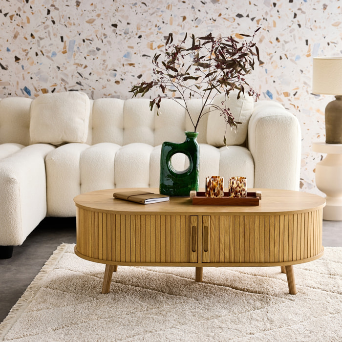 Table basse 2 portes coulissantes avec 3 compartiments effet bois rainuré. L 110 x P 59 x H 39cm