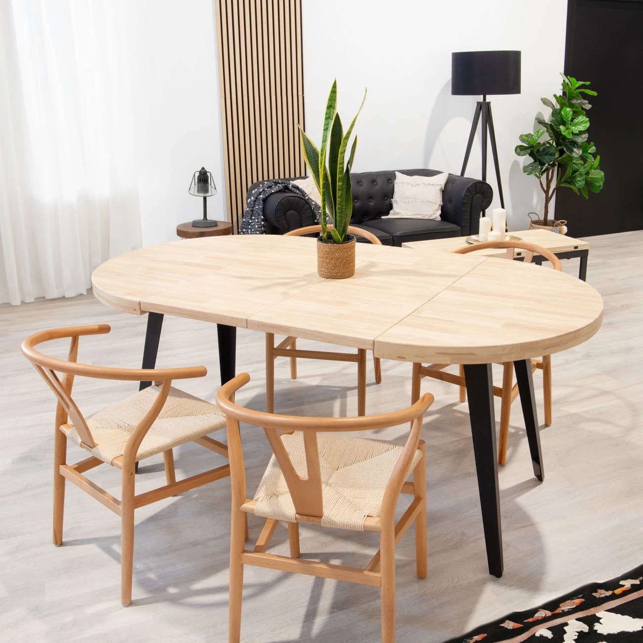 Mesa de comedor redonda extensible en negro y roble 100-180x100 cm Berg Negro - Roble