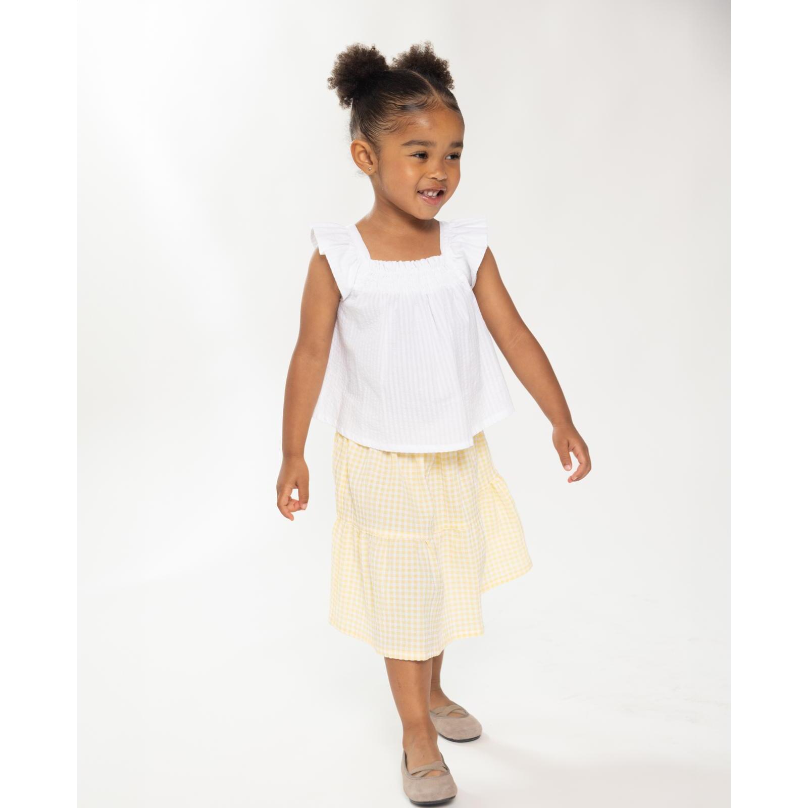 Falda midi cuadro vichy amarillo. Hecha de volantes, elastica en la cintura.