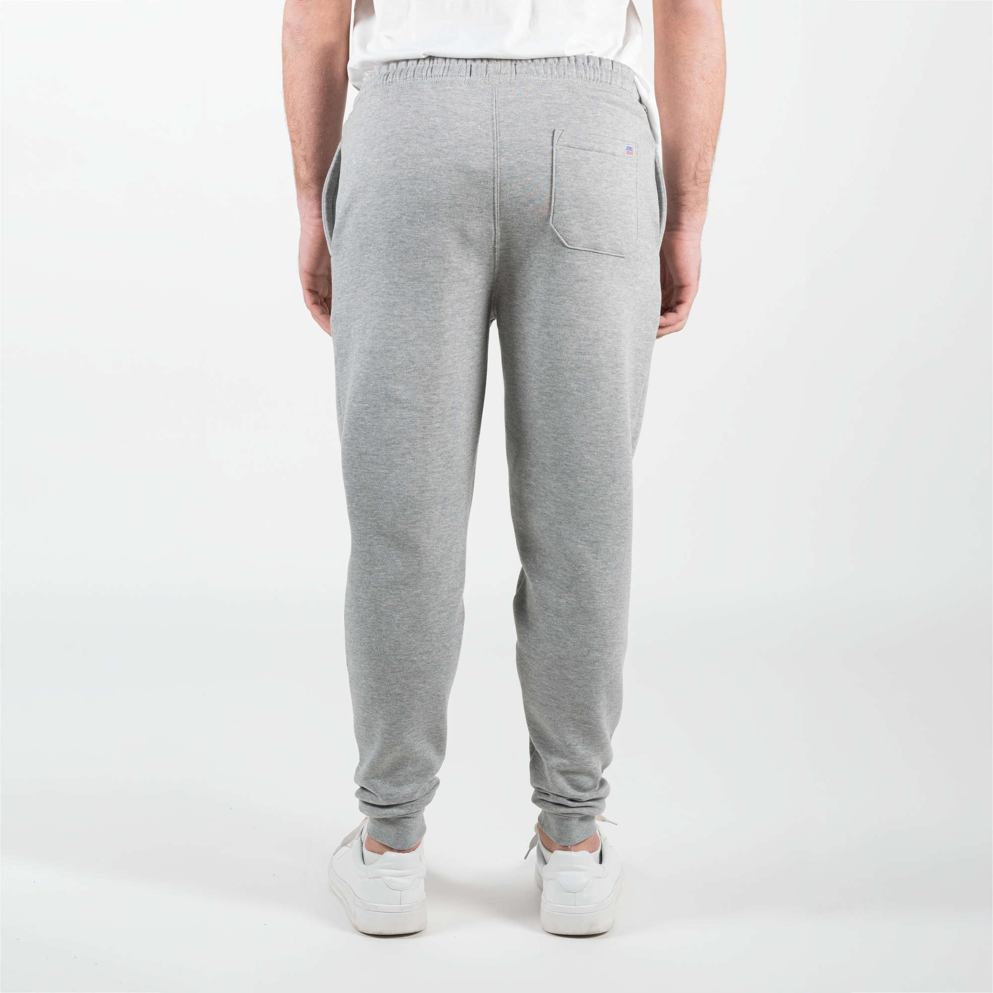 Patalone felpato in pile con patch della bandiera americana cucita sulla tasca posteriore