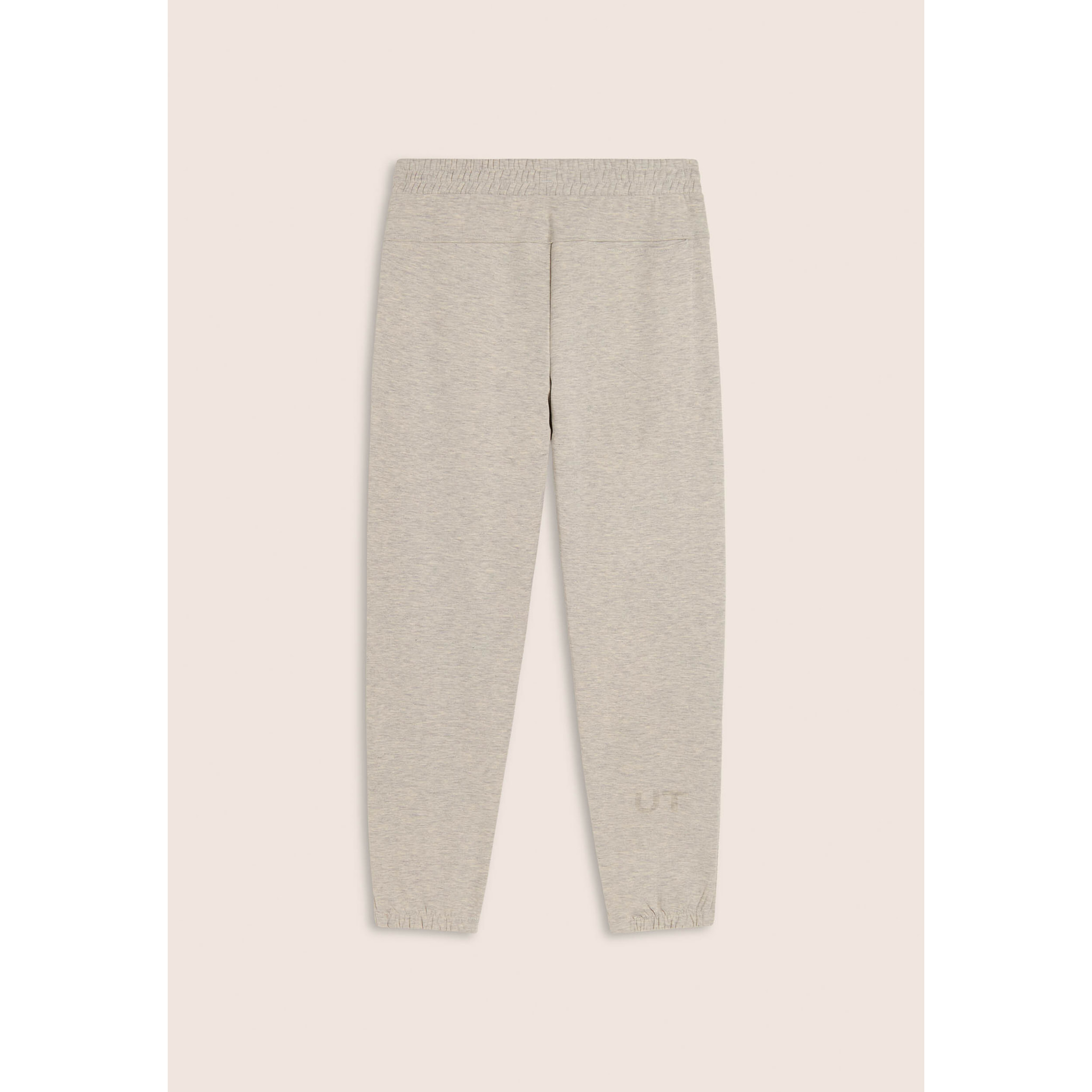 Pantaloni slim mélange con stampa trasparente e zip