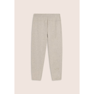 Pantaloni slim mélange con stampa trasparente e zip