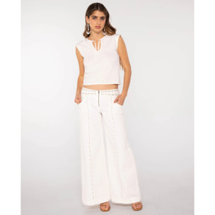 Top tipo cut out con lazo en el escote y tirantes de mujer