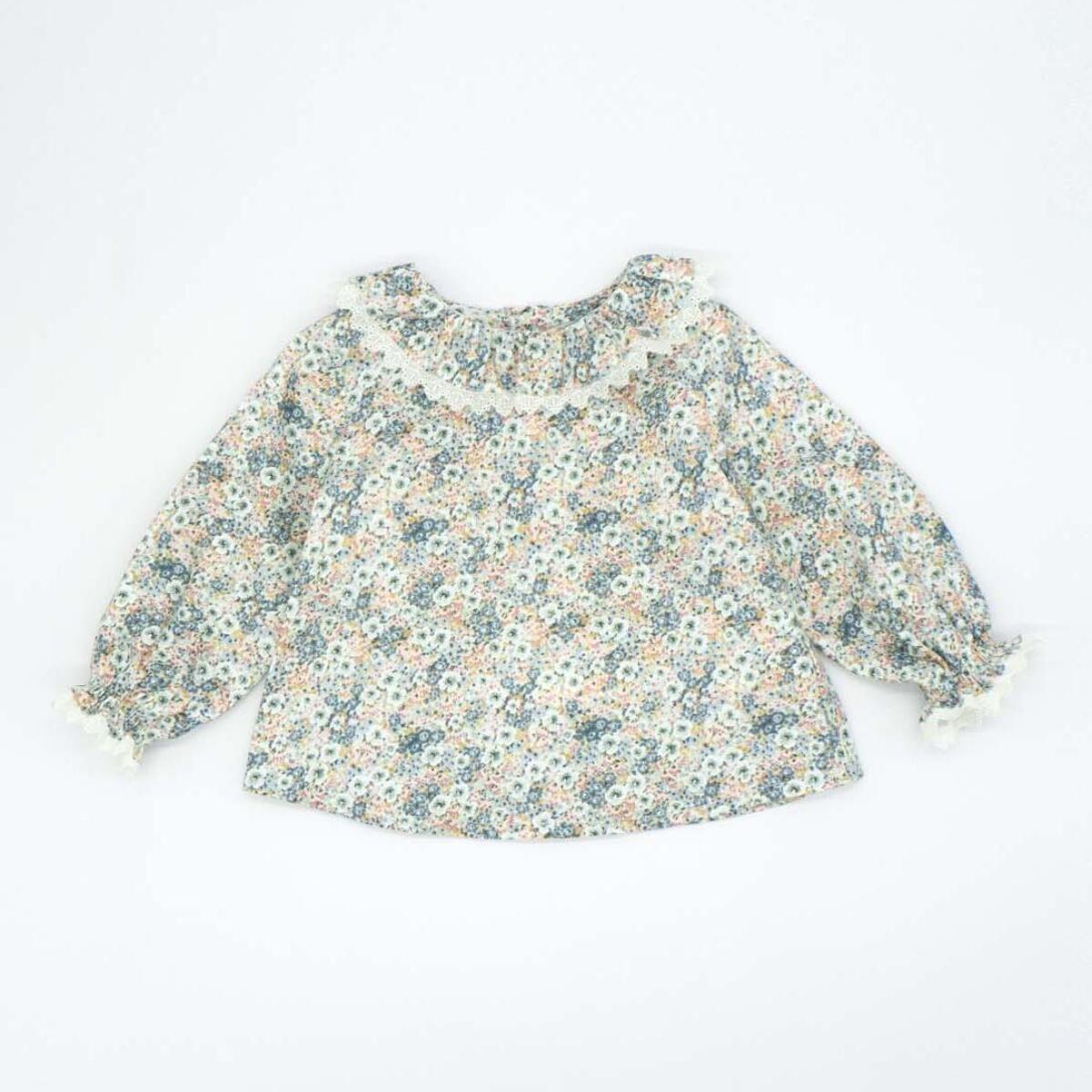 Blusa flores con volante