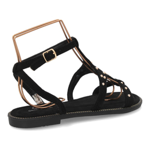 Sandalia plana elegante mujer tachuelas