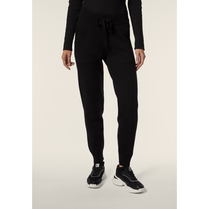 Pantalone in maglia tricot rasata con polsini e vita a coste