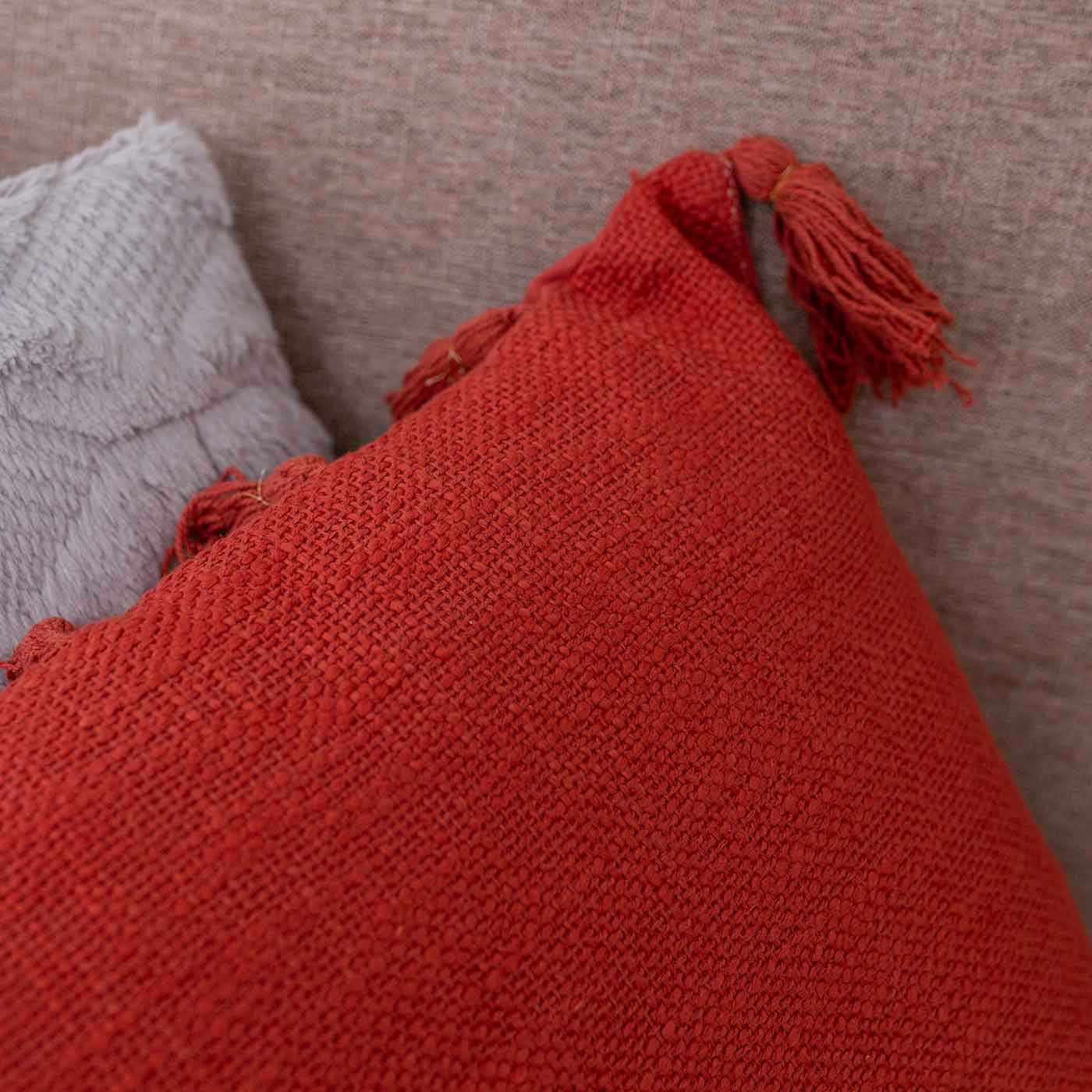 Coussin samael terracota pompons