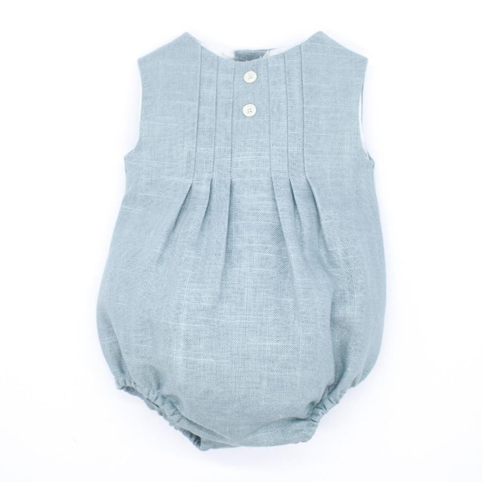 Pelele de lino verde. Con pliegues en el delantero y botones de decoracion.