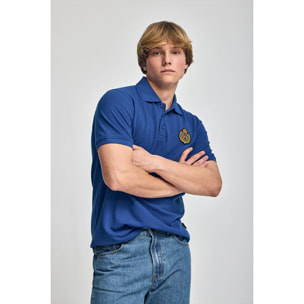 Polo Nautic azul royal con detalle de parche naútico en el pecho