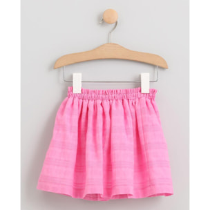 FALDA VOILE ROSA CON LAZO SEERSUCKER