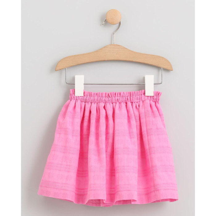 FALDA VOILE ROSA CON LAZO SEERSUCKER