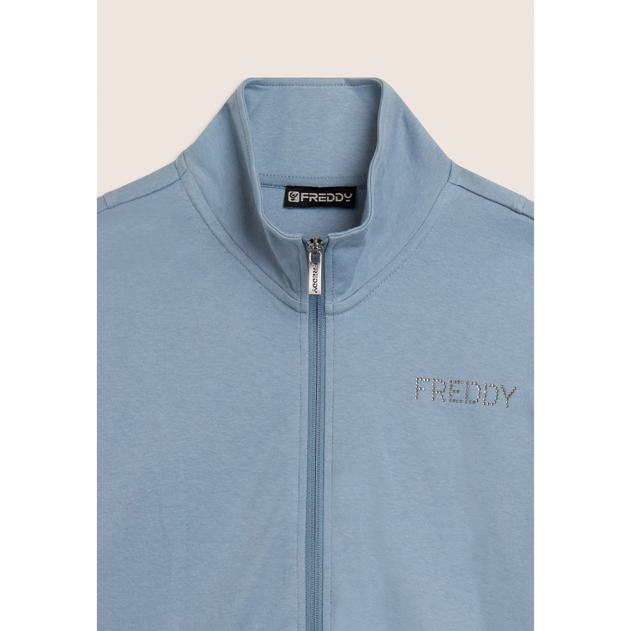 Tuta con zip e collo alto, logo con strass