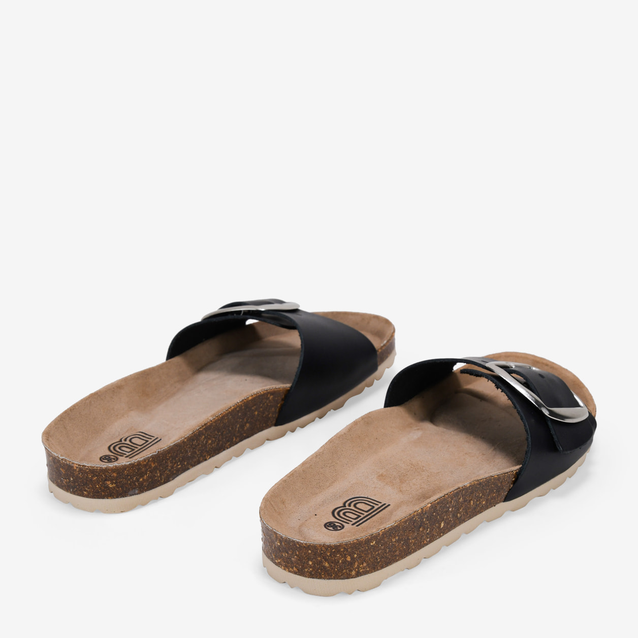 Sandalias planas negras en piel con hebilla grande