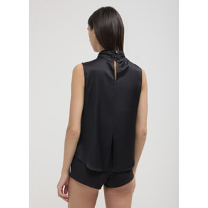 Blusa smanicata con fiocco