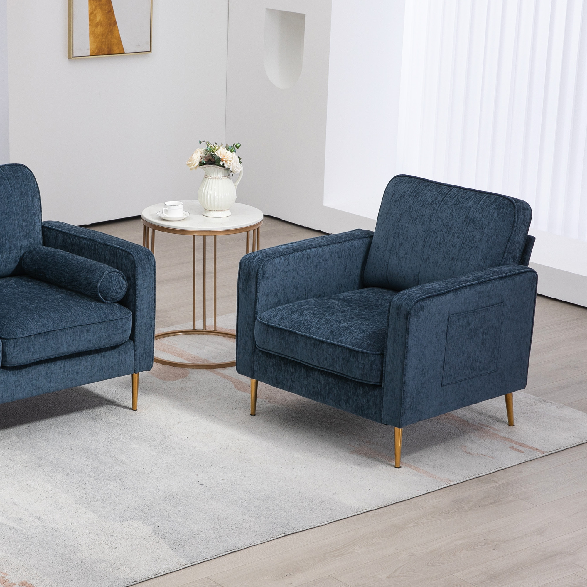 Fauteuil style art déco piètement métal doré tissu bleu