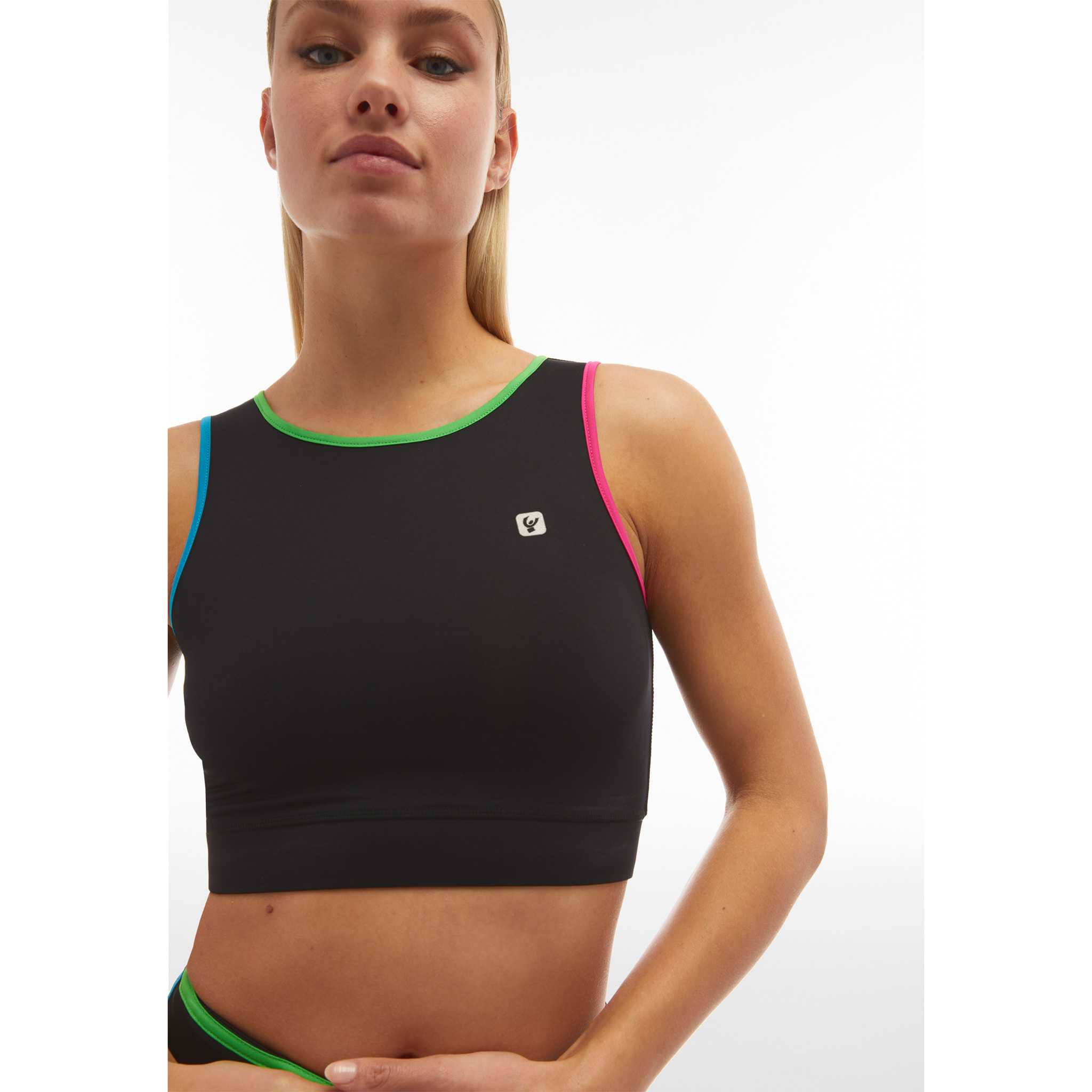 Top fitness a sostegno medio con bordature colorate