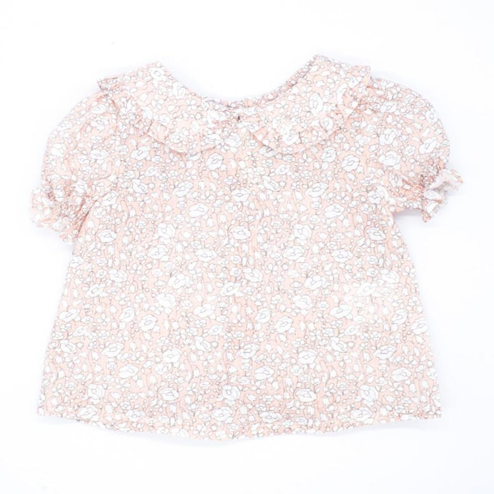 Blusa estampado de flores rosas, con manga abullonada y cuello.