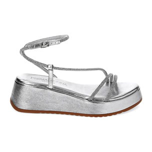 Cuñas plateadas laminadas con piedras