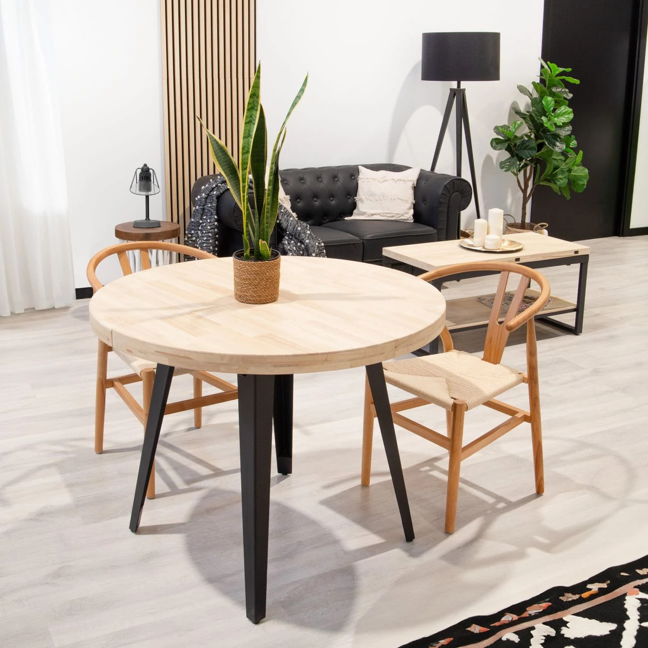 Mesa de comedor redonda extensible en negro y roble 100-180x100 cm Berg Negro - Roble