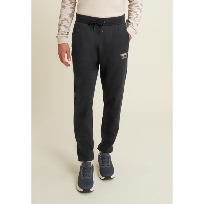 Pantaloni in felpa con fondo a polsino e dettagli rigati