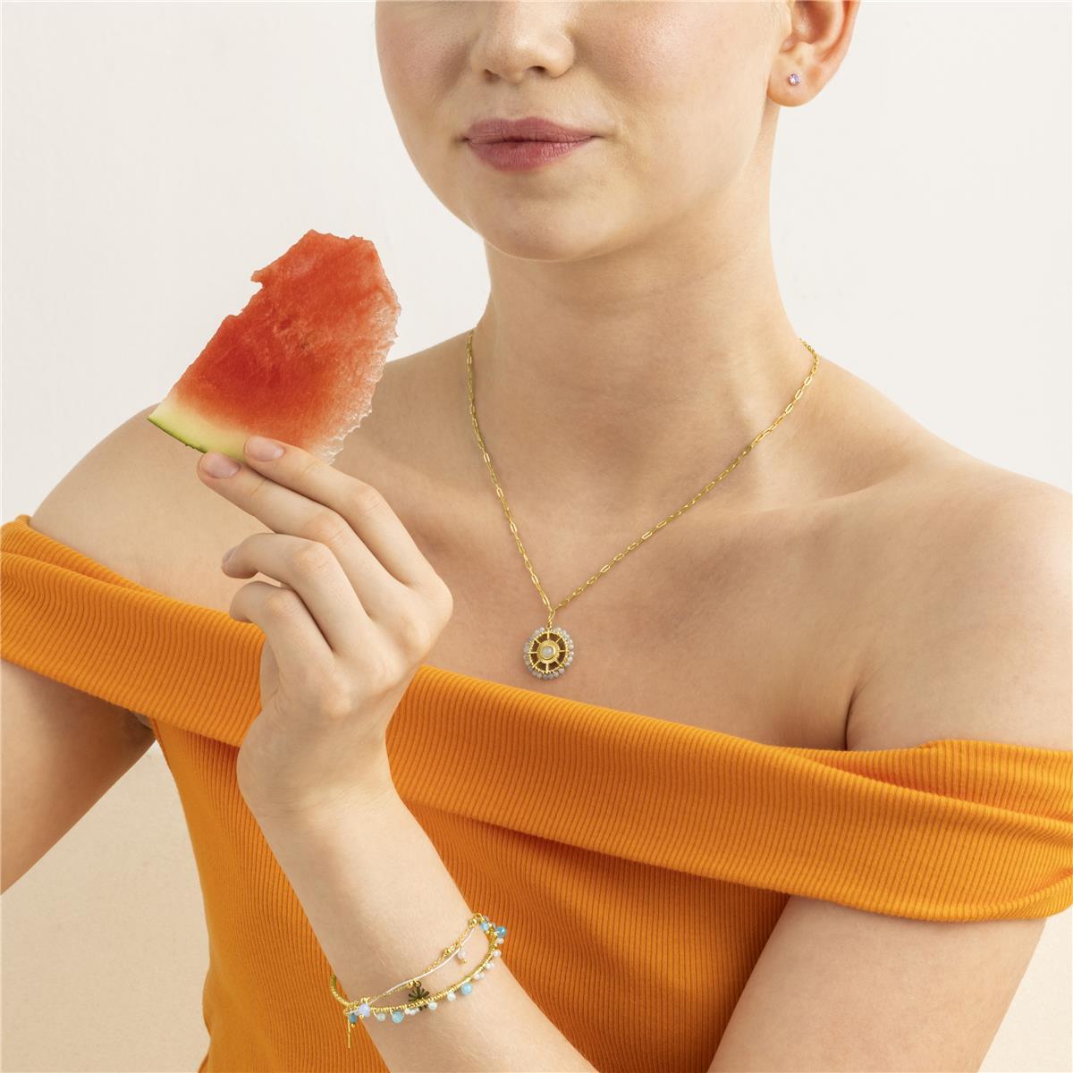 Brazalete con Cristal Azul acabado oro 18k