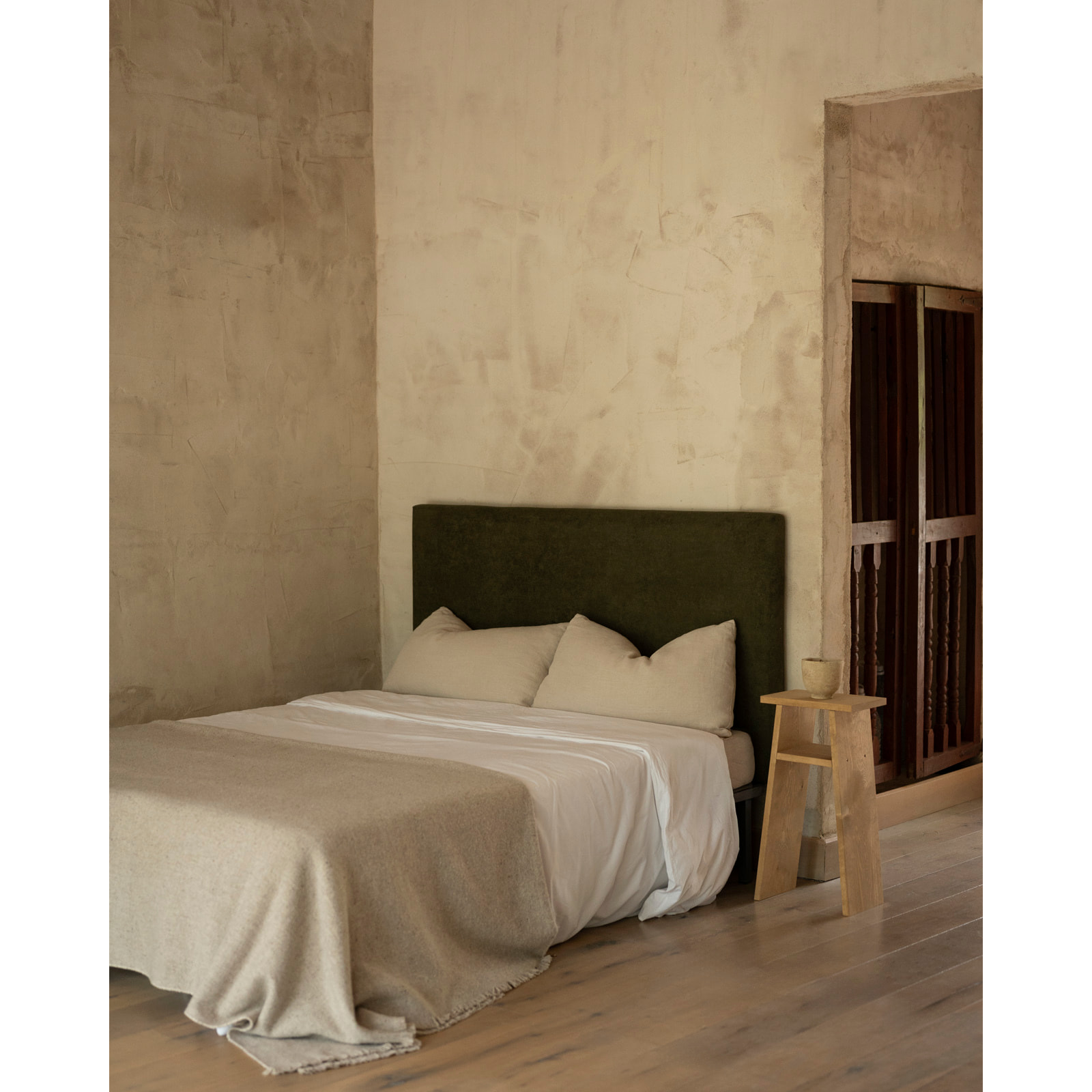 Cabecero tapizado en color verde de varias medidas