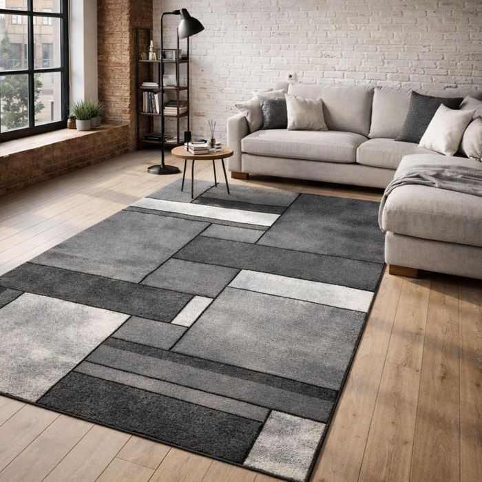 Tapis Tuho aux couleurs grises et aux motifs géométriques