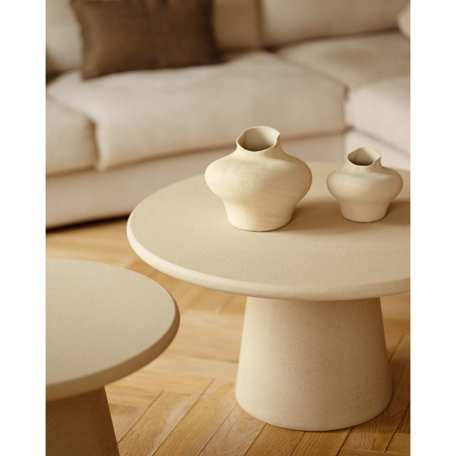 Table basse ronde en microciment ton beige en différentes tailles