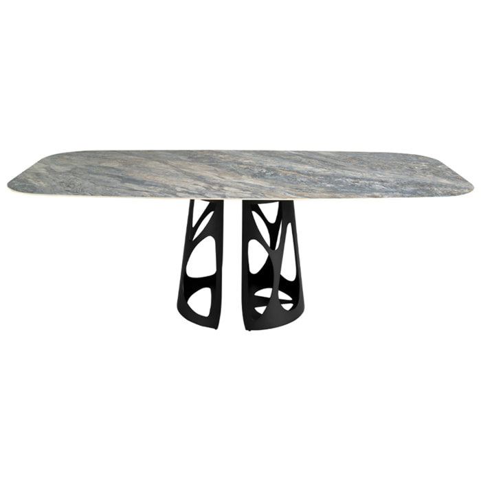 Mesa comedor Angel Cerdá ovalada barril con tapa fija de mármol porcelánico azul con vetas en tonalidades grises y marrones en acabado brillo 238x110x76cm