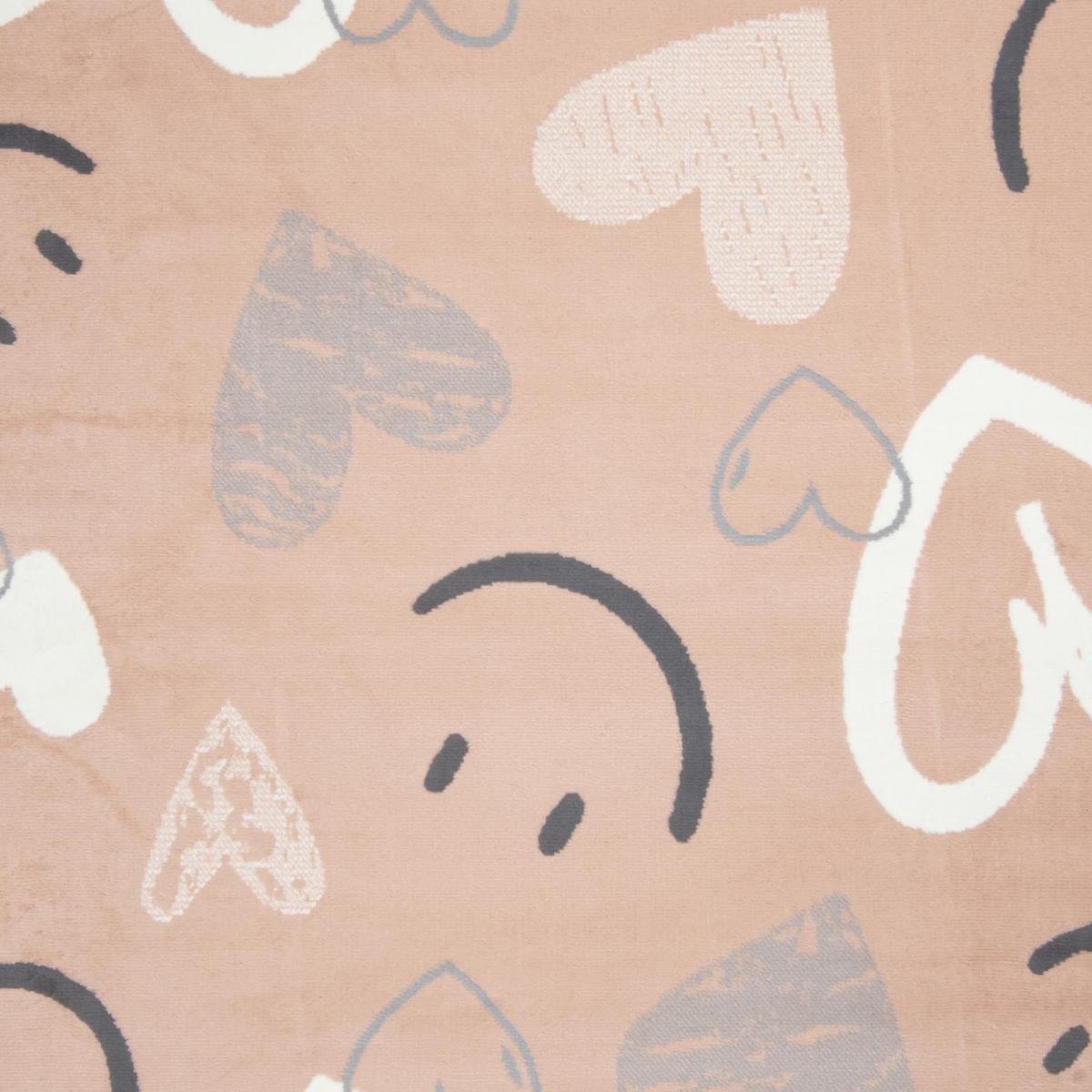 Tapis enfant motif cœurs et smileys, design ludique et joyeux