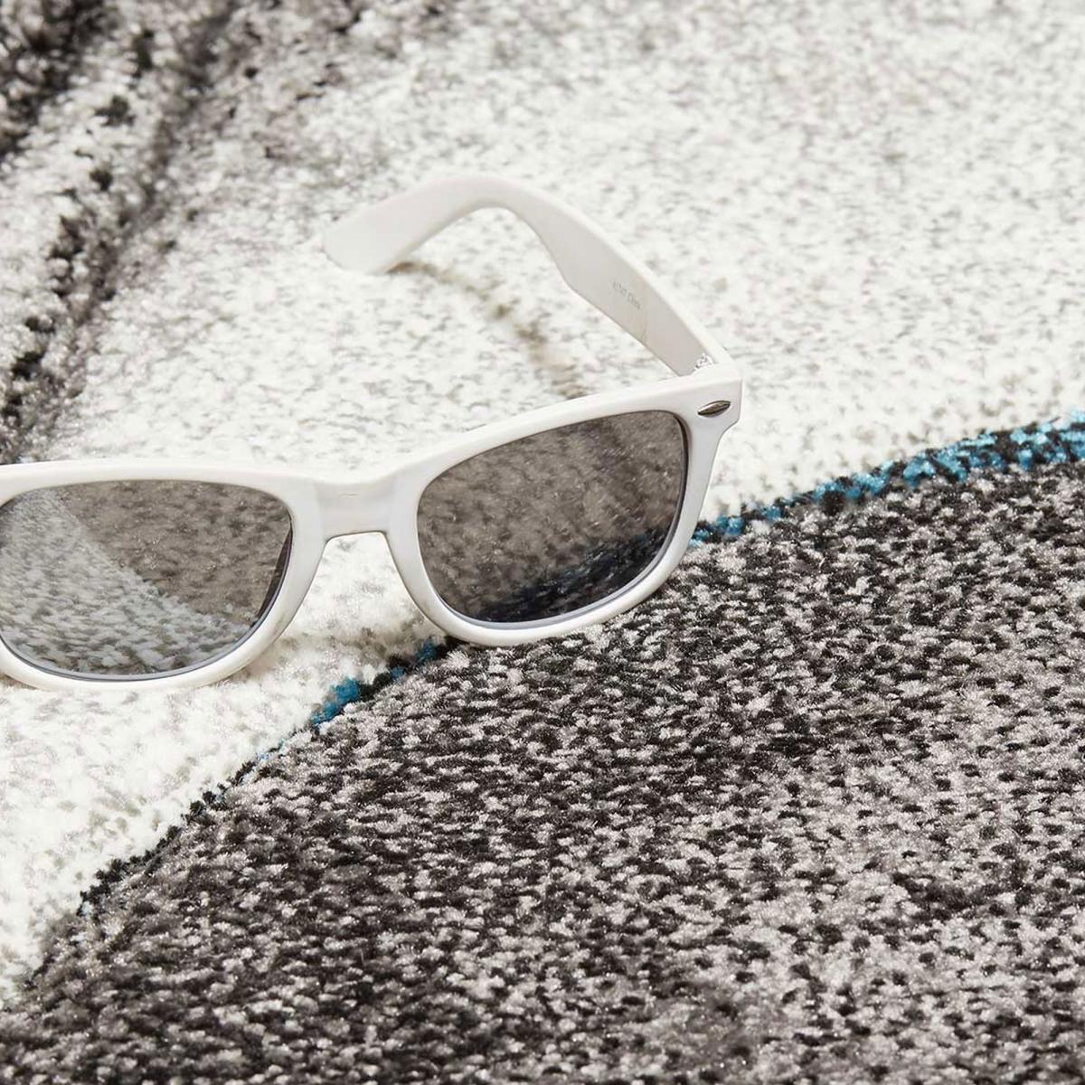 Tapis moderne Tavo avec motif de gouttes d'eau