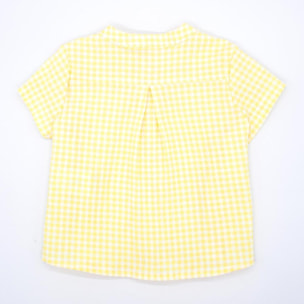 Camisa de manga corta estampado de vichy amarillo. Cuello mao y bolsillo en el delantero.