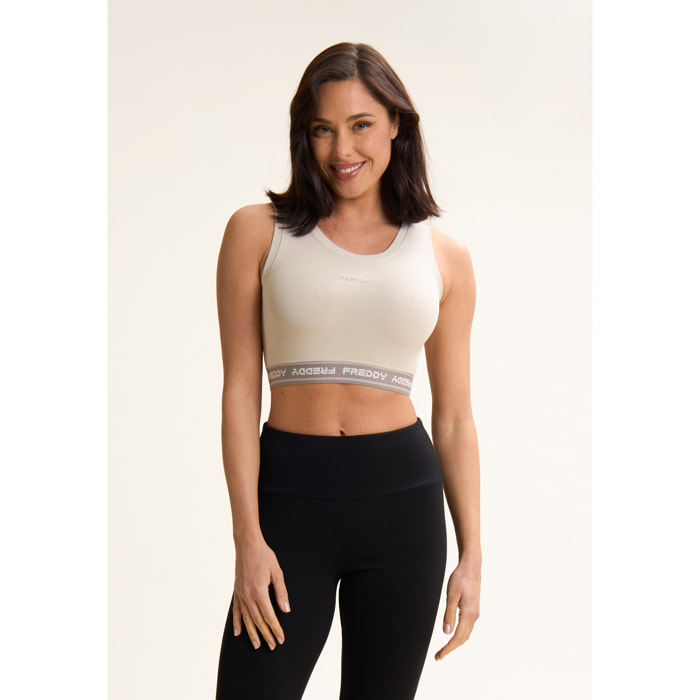 Top sportivo in heavy jersey stretch con elastico logato