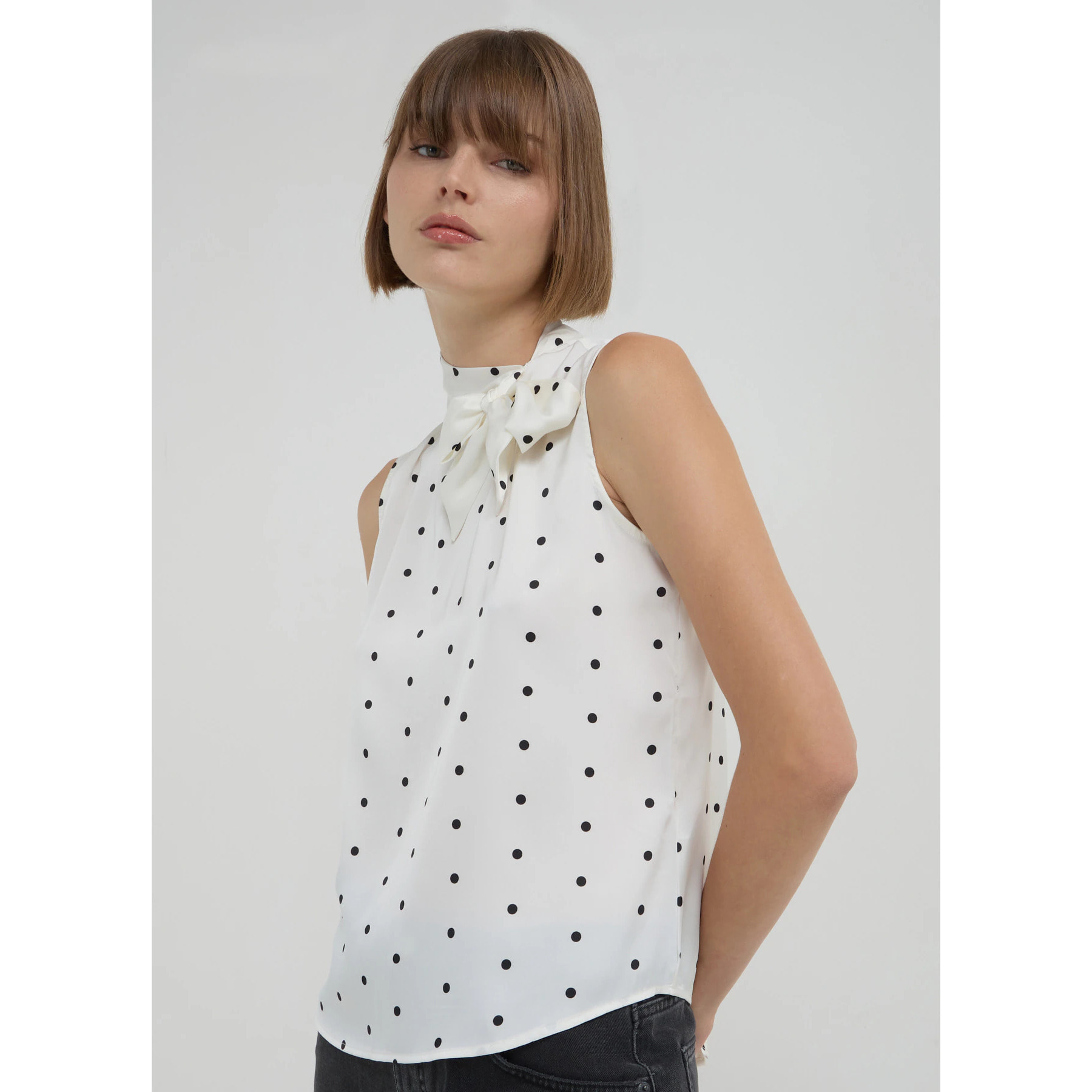 Blusa smanicata a fantasia