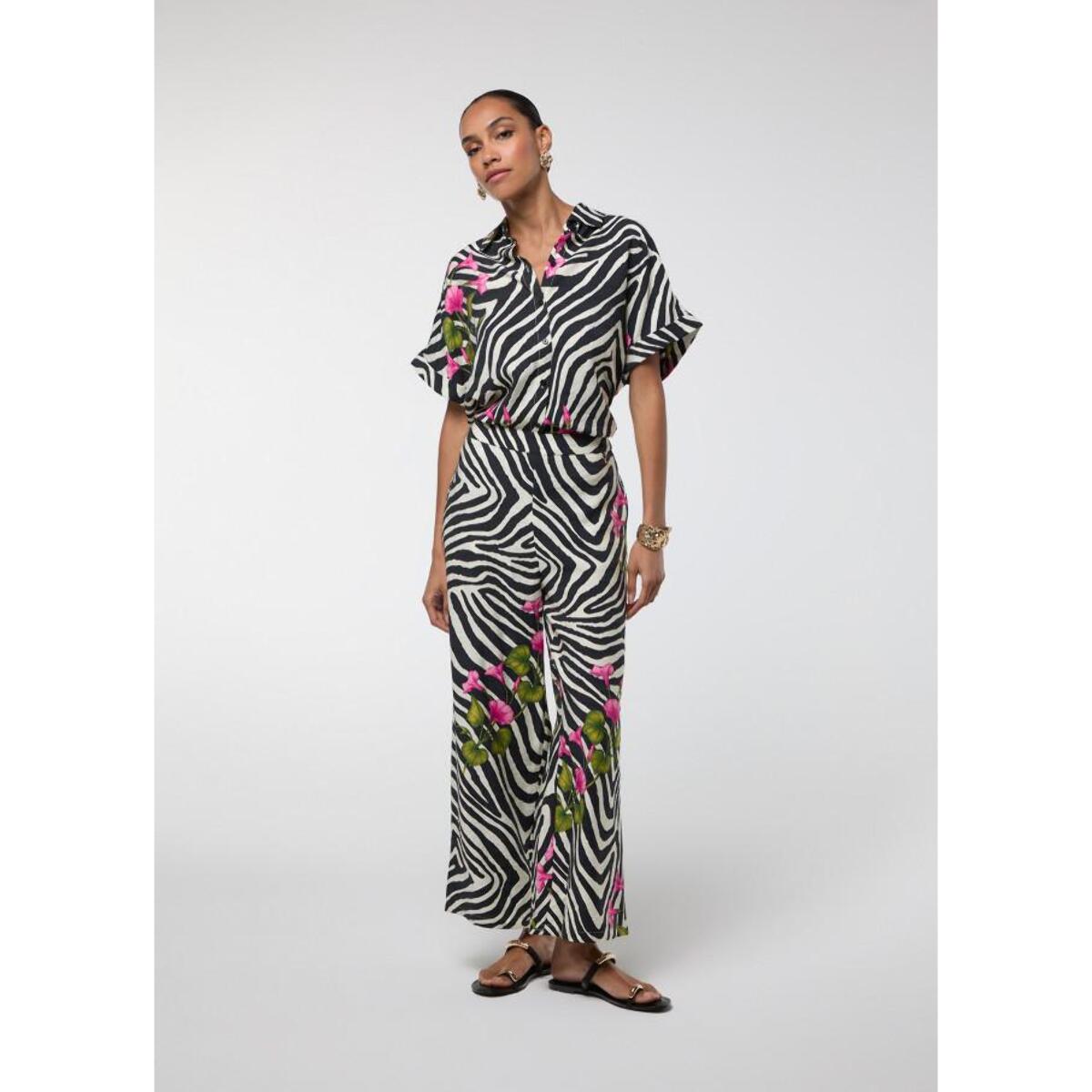 Pantaloni con stampa zebra e fiori