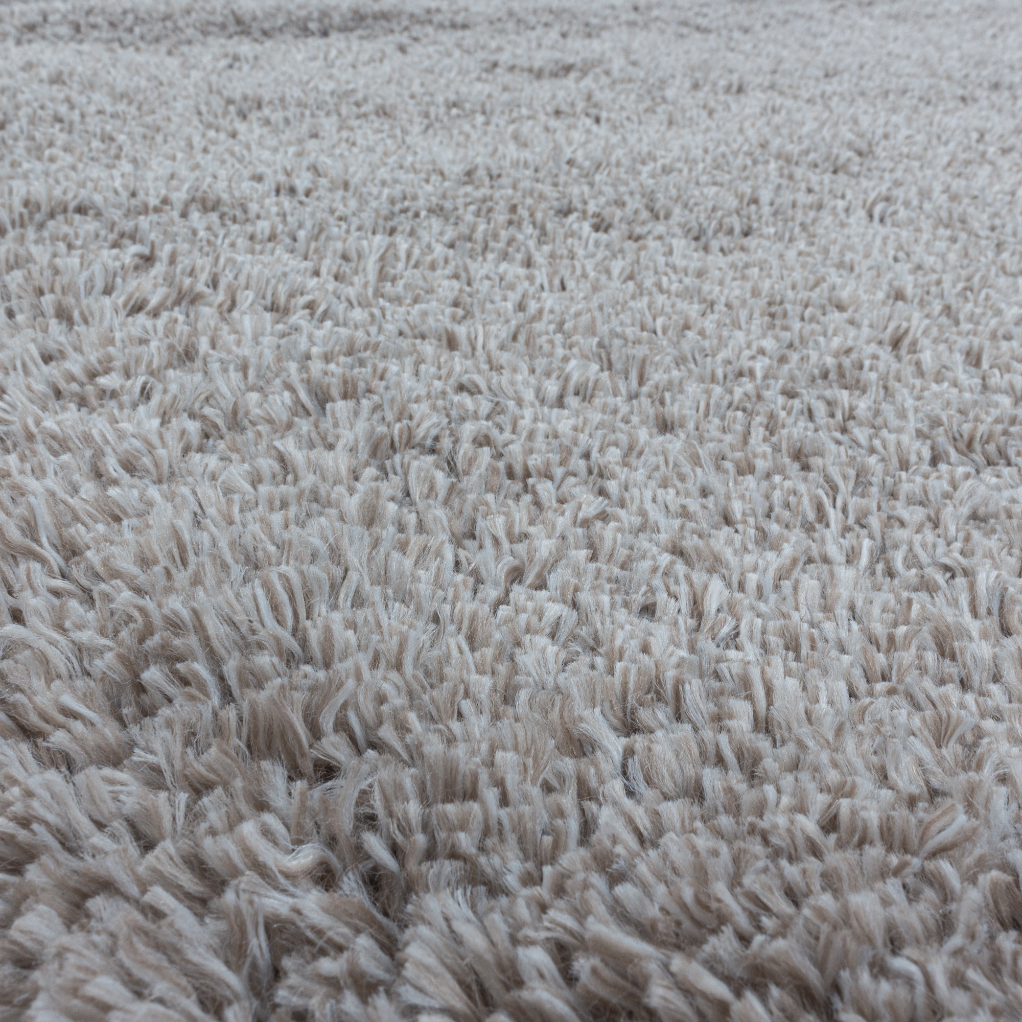 FLUFFY - Tapis rond shaggy uni à poils longs Beige