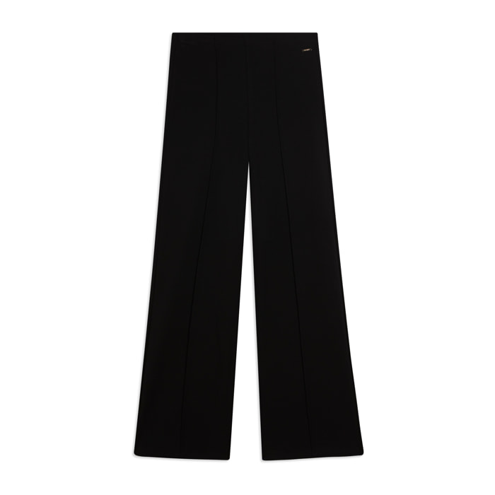 Pantaloni slim con gamba ampia e dettaglio piping