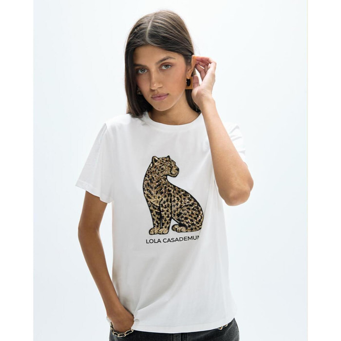 T-shirt girocollo con spacchi laterali e paillettes leopardate posizionate strategicamente