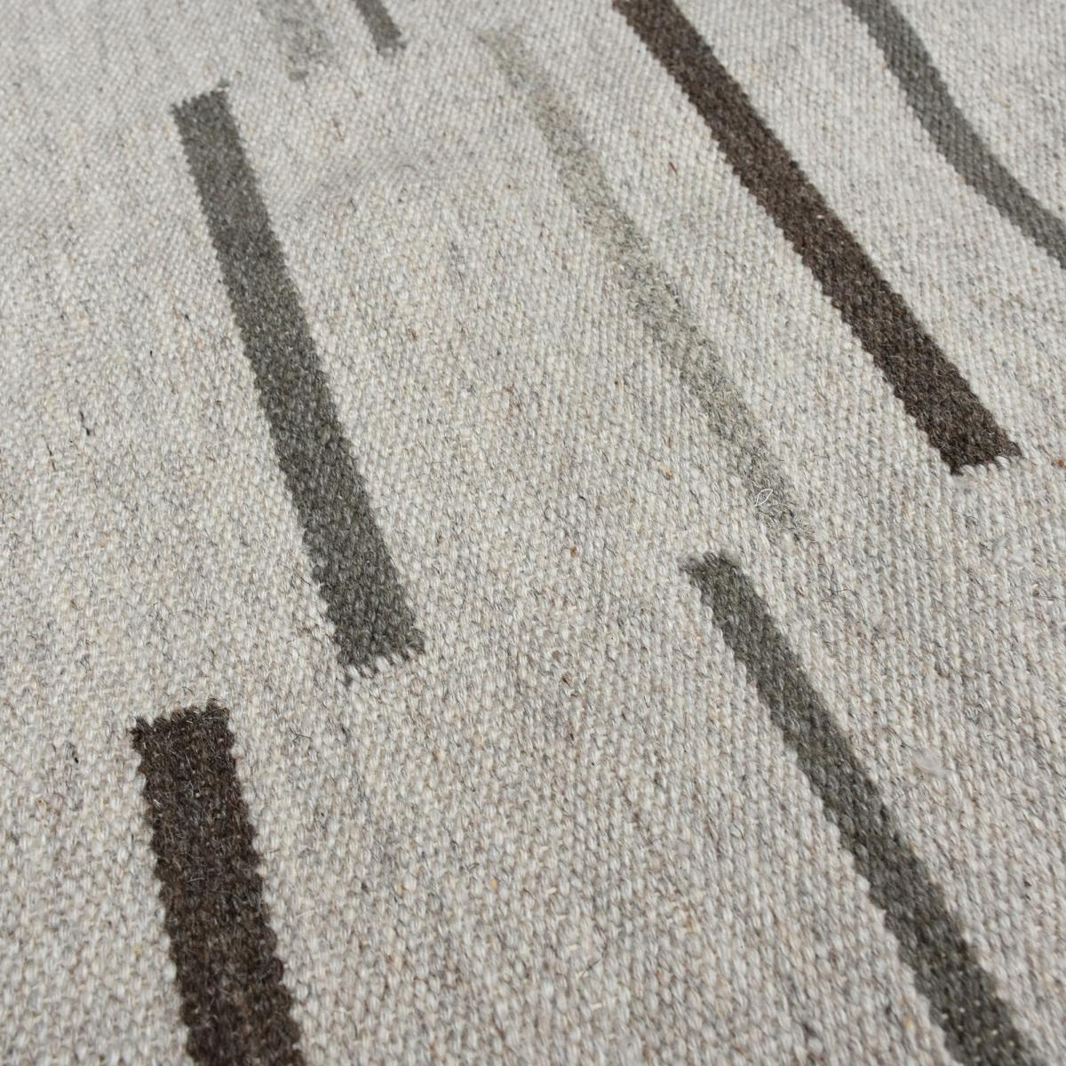 Tapis kilim fait à la main en laine motif géométrique