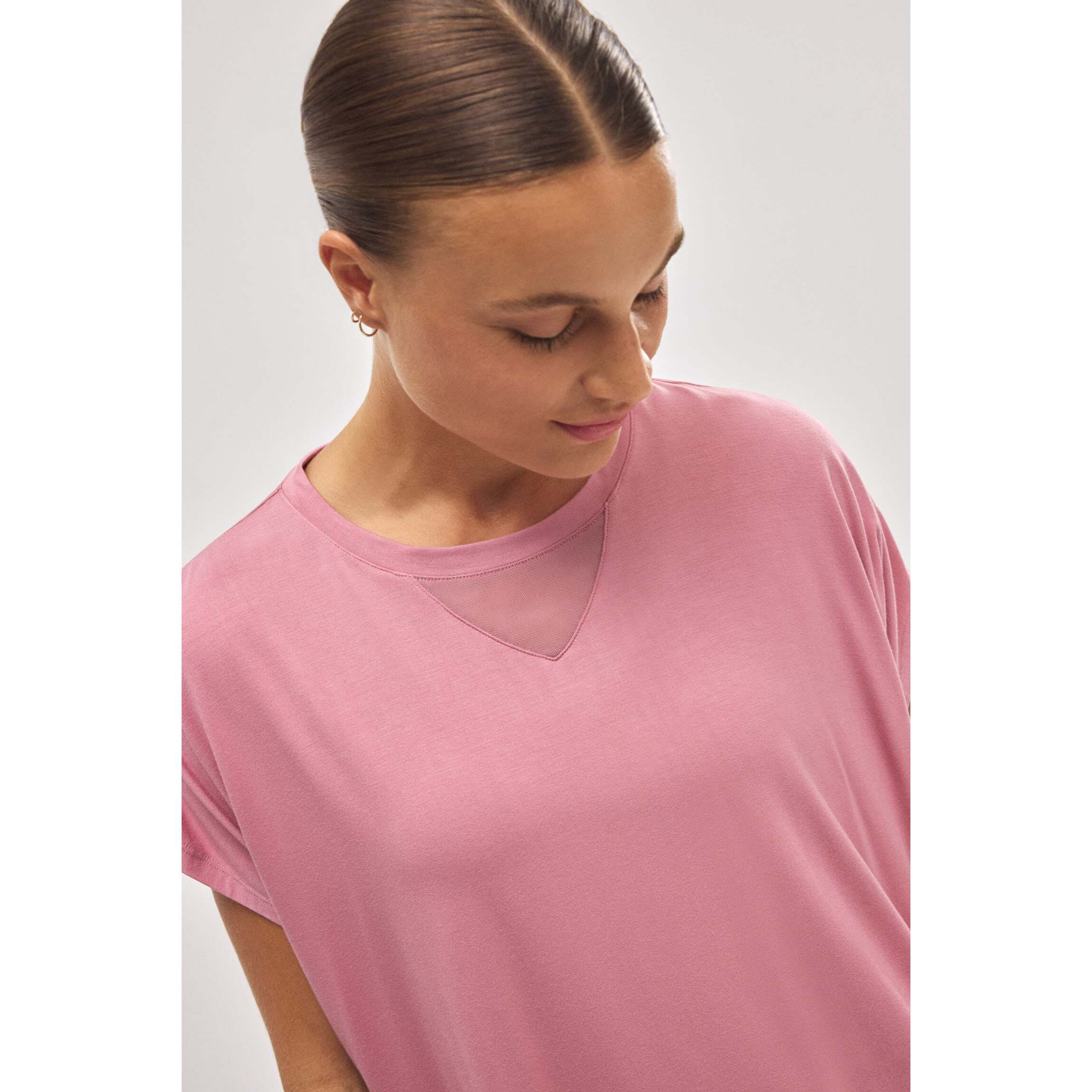 Maglietta sportiva rosa a maniche corte