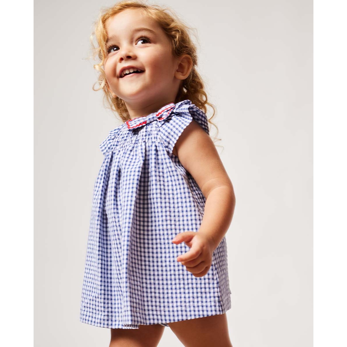 VESTIDO CON GOMAS Y VOLANTE CUADRO VICHY AZUL Y BLANCO