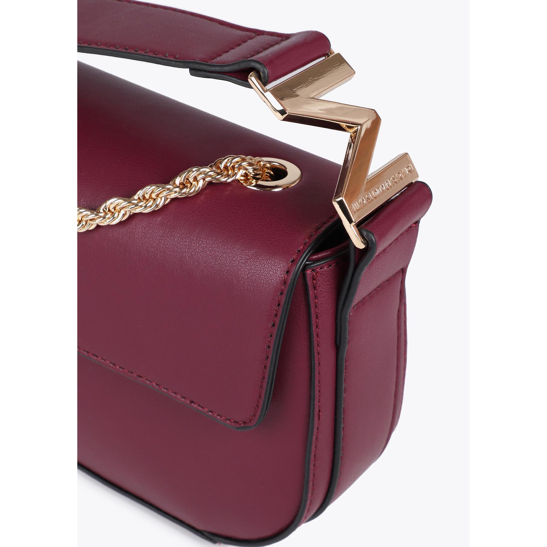 Tracolla in pelle sintetica con logo M sulla maniglia