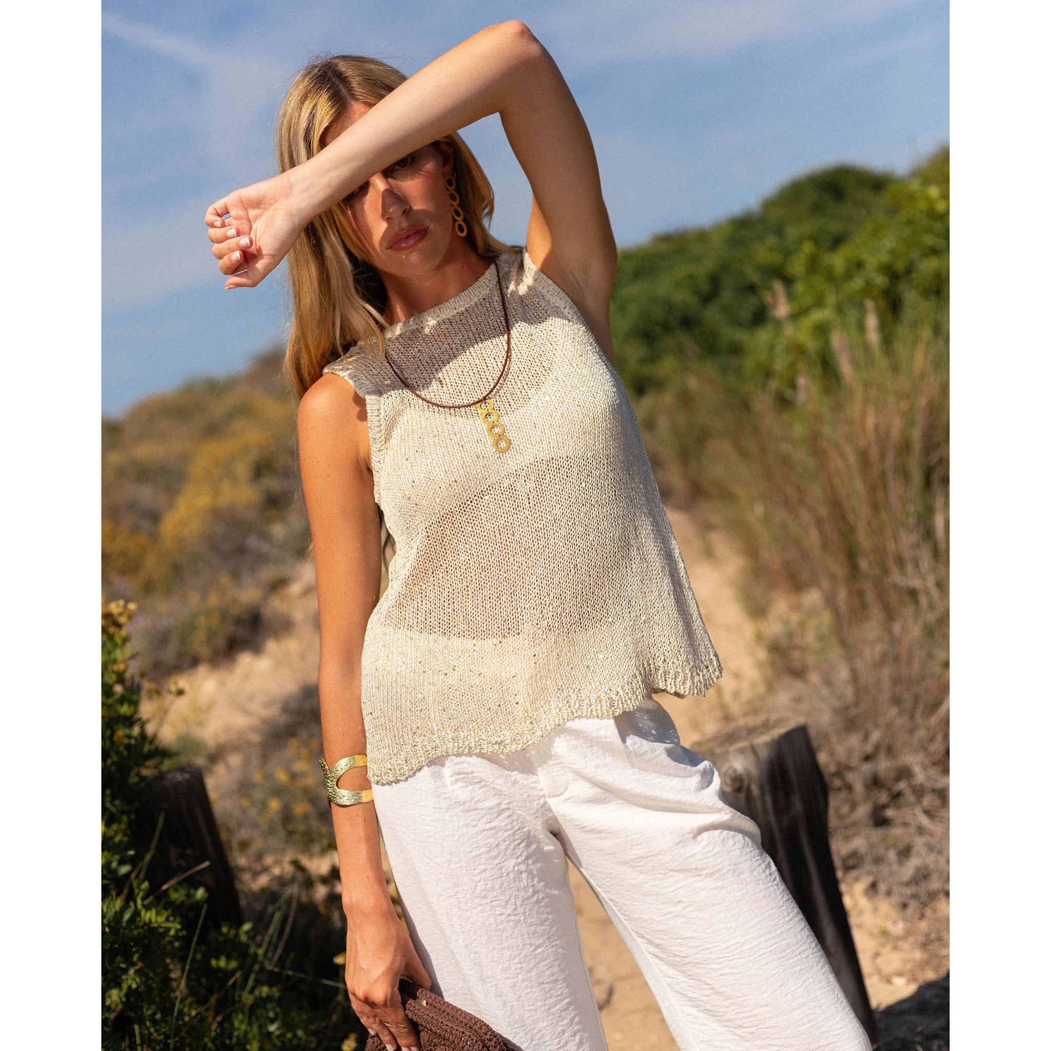 Top de mujer de punto con brillo metalizado