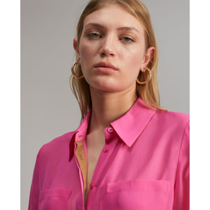 Camicia semitrasparente con tasche