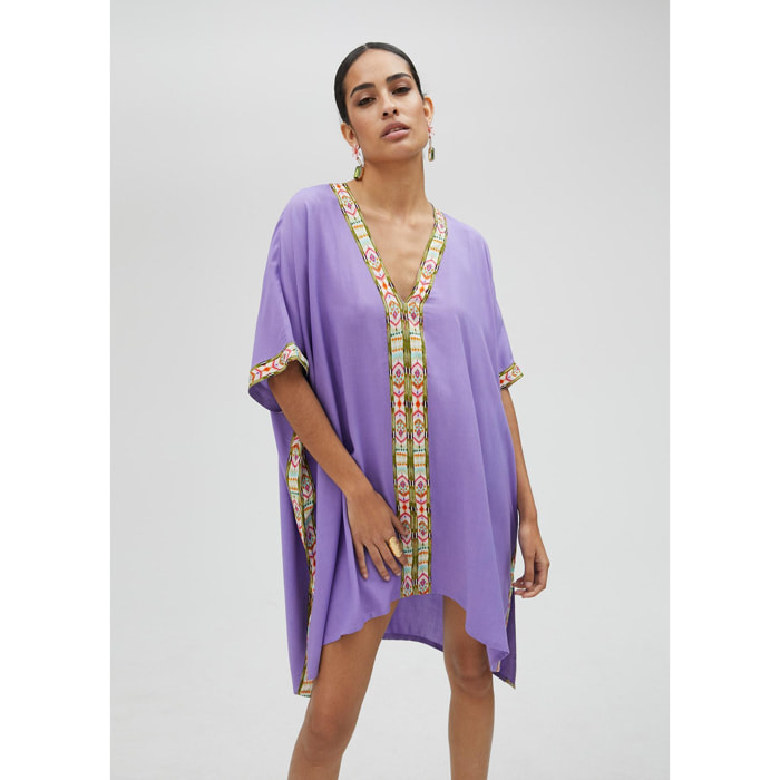 Tunica corta dettaglio