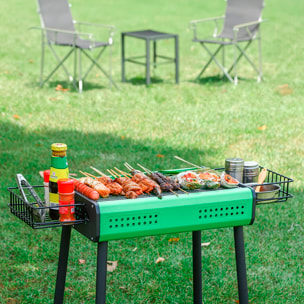 Barbacoa portátil de carbón CA-26 con patas desmontables, dos bandejas grill, cestas laterales y ventilación optimizada para una cocción uniforme.