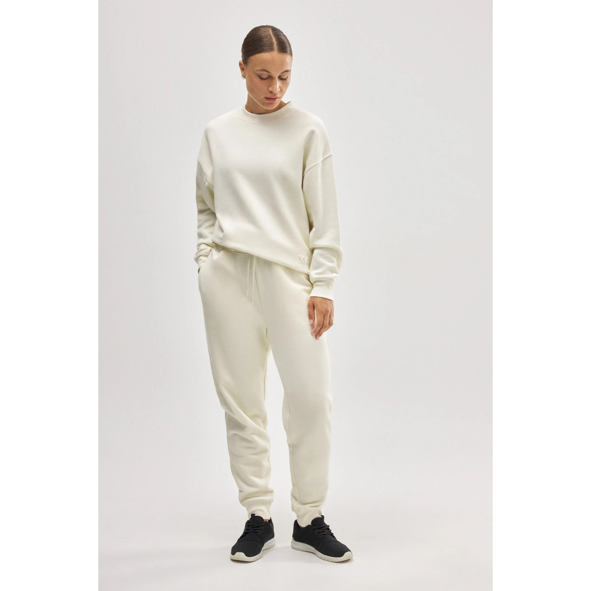 Pantaloni jogger in pile avorio con cintura regolabile