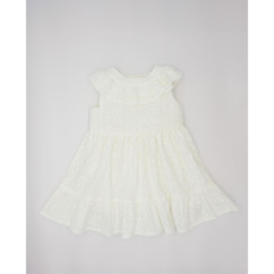 Vestido de voile bordado blanco. De tirantes con doble volante en el cuello, falda fruncida con volante.